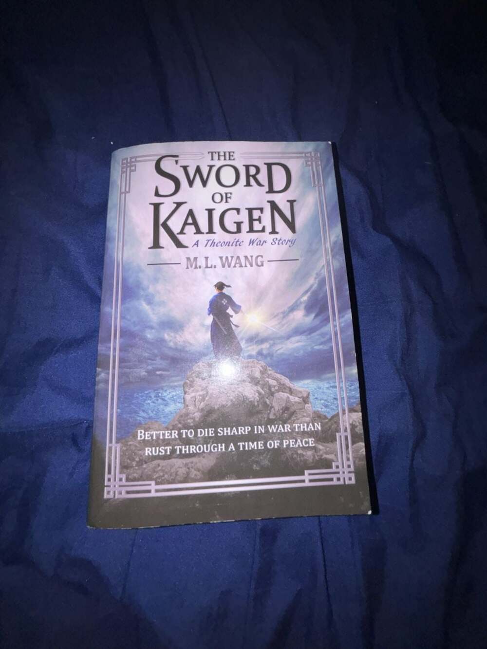 The Sword of Kaigen: A Theonite War Story by M.L. Wang
